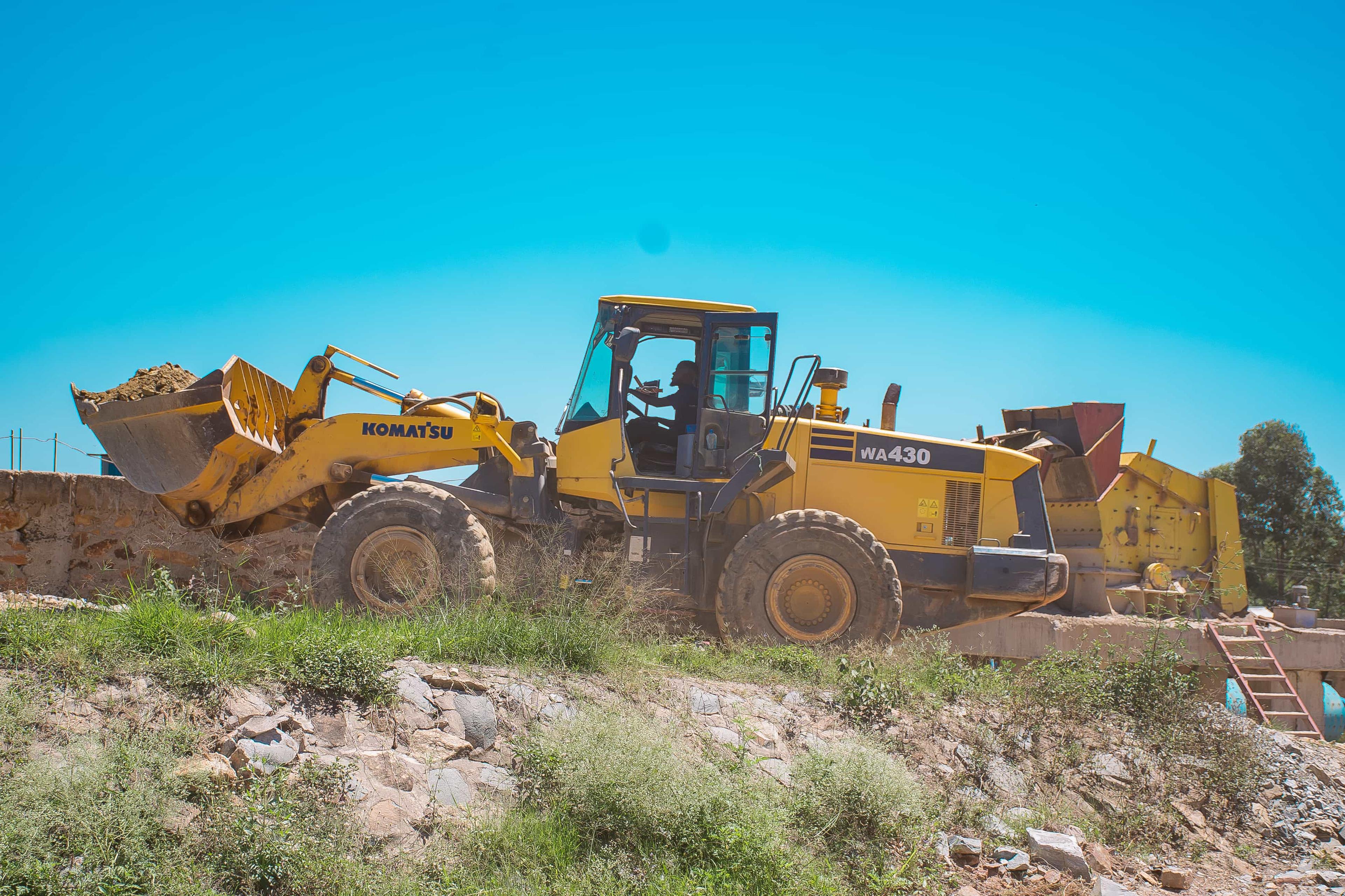 Heavy Machine Carrying Earth